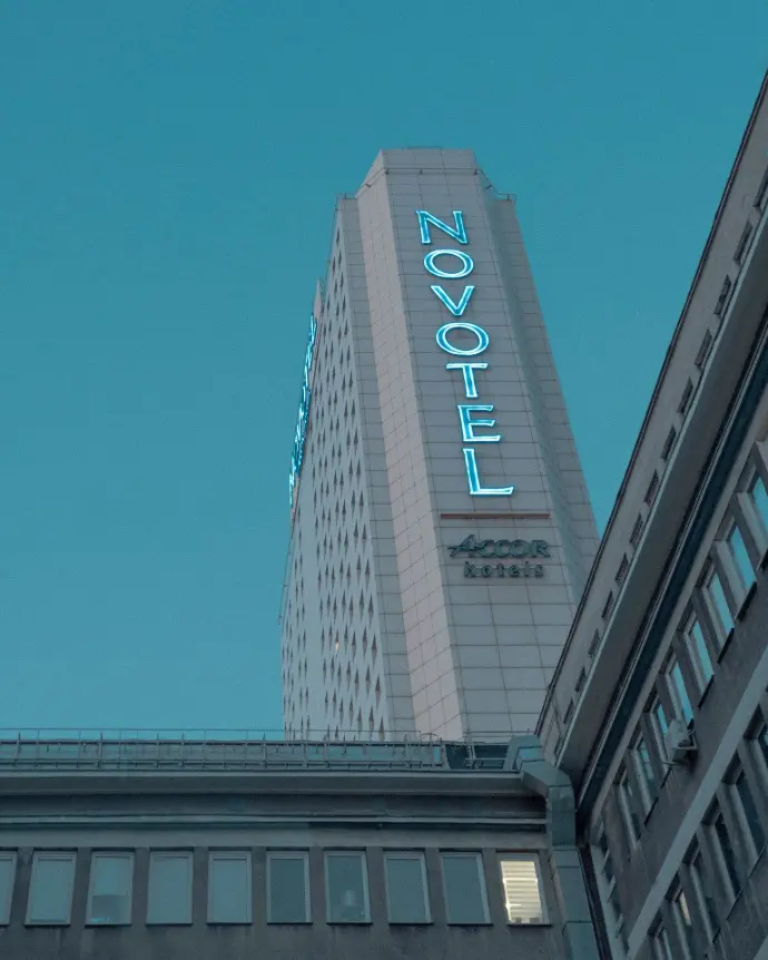 a tall building with a sign on it